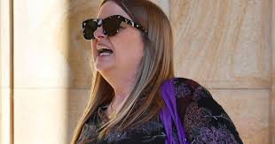 Adelaide woman admits wine committee theft