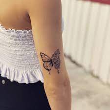 Butterflies have always been a source of inspiration for people of all ages. Fine Line Half Butterfly Half Flower Tattoo On The
