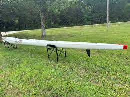 Epic V10 double ultra layup fast & light AJ and I won men's tandem 2 year  ago in this. It's got epic custom canvas bag included. It has a couple  repairs nothing