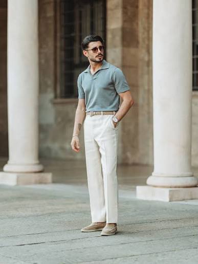 men wearing a blue polo shirt and white pants
