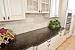White Kitchen Cabinets With Brown Quartz Countertops