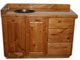 This contemporary alder medicine cabinet was custom made to match the vanity beneath. Rustic Alder Vanity