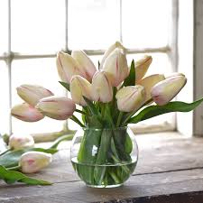 These designs minimize rot when growing tulips in water. 4 Ways To Keep Tulips From Drooping Better Homes Gardens