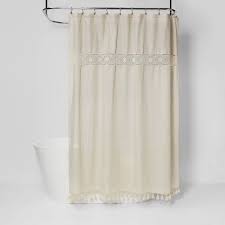 Whimsically boho shower curtain featuring mixed geometric prints all over the cotton weave. Solid Crochet With Tassels Shower Curtain Tan Opalhouse Target