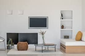 Open plan living room and bedroom. Photo 9 Of 18 In A Modern Home Is Gently Slotted Into A Steep Slope In Santorini Dwell