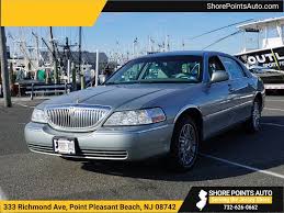 Image result for Light Ice Blue 2006 Town Car