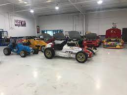 You don't have to be a diehard racing fan to enjoy hopping into the racing simulator or attempting the pit. Ken Schrader Racing Auction Racing News