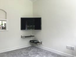 Wall mounted tv ideas look wonderful when coupled with open racks since they make the contrasts less noticeable. Corner Tv Mount And Floating Shelves Quite Pleased With The Final Result Wall Mounted Tv Swivel Tv Stand Tv Wall