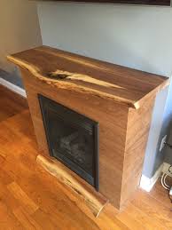 Here at redwood burl, we cut mostly redwood. Hand Made Walnut Fireplace With Live Edge Mantel By Michael Xander Custommade Com