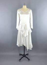 I choose white color for the 1920s drop waist dress and red for the flowers. Vintage 1920s Wedding Dress Art Deco Satin Bridal Gown