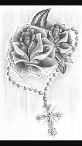 Tattoo Idea Rosary With Roses Cage Tattoos Ribcage Tattoo Ribbon Tattoos