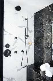 Black And White Marble Tiles Black Marble Herringbone Pattern Shower Wall Tiles Complement A Black Marble Bench And Contrast Whit Black Marble Bathroom Marble Shower Walls Shower Wall Tile