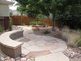 When i finish laying a flagstone patio, it's usually about 85 percent wobble free. Concrete Seat Wall Sandscape Finish With Colorado Buff Flagstone Cap Modern Patio Denver Von Lid Landscapes Houzz