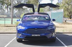Tesla motors' nsdq:tsla model x is set for an official reveal tomorrow when the first examples of the now we have a look at its 'falcon' doors in action. Tesla Model X 2018 Review 75d Carsguide