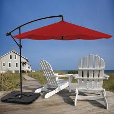 The free standing parasols are designed for use on home patios and outdoor gardens. Pure Garden 4 Piece Weighted Cantilever And Offset Patio Umbrella Base With Handle In Black Hw1500212 The Home Depot
