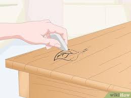 Rub gently and soon you will see the ink transferring to the cotton ball or swab. 3 Ways To Get Permanent Marker Off Of Wood Wikihow