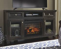 You should consider features while shopping for an electric fireplace, too. Townser 62 Tv Stand With Electric Fireplace W636w8 30 W100101 Tv Stands And Media Centers Pratt Furniture