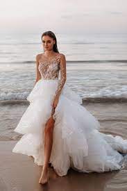 20 Utterly Romantic Wedding Dresses For The Fashion Forward Bride Bride Reception Dresses Wedding Dresses Romantic Wedding Dresses