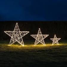Step into a winter wonderland every time you arrive home with a few of our favorite snowflake decoration ideas. Outdoor Led Star Light Trio Outdoor Christmas Light Displays Outdoor Christmas Lights Large Outdoor Christmas Decorations