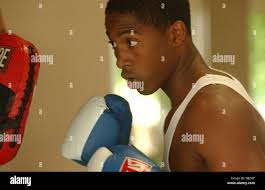 Jun 23, 2004; Brownsville, TX, USA; Spectators scream and shout during a  boxing match at the National Junior Olympic in Brownsville, Texas. Many  kids from around the United States showcase their talent