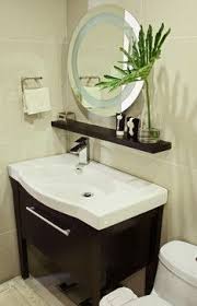 Shelf Above Vanity Sink In Bathroom So Many Uses And Keeps Clutter Away From The Floating Shelves Bathroom Powder Room Design Floating Shelves Living Room