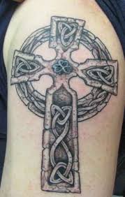 You can get yours done with a set of circles or curves that are entwined around the cross. 150 Best Cross Tattoos For Men 2020