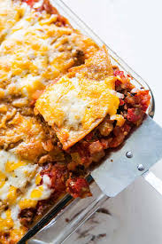 Mexican Lasagna Taco Lasagna Simplyrecipes Com Recipe Mexican Lasagna Food Mexican Food Recipes