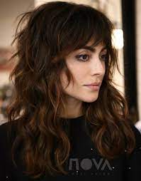 Complement your long straight layers with a sharp fringe. 60 Lovely Long Shag Haircuts For Effortless Stylish Looks
