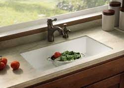 It is a solid surface material that has inconspicuous seams giving the countertop a monolithic look. Solid Surface Countertop Review Corian Swanstone Staron Hi Macs