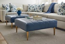 So i used my miter saw to cut the bottom foot off, as well as one inch from the top stretcher block. Blue Channel Tufted Ottomans With Gold Legs Transitional Living Room