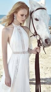 We couldn't resist the lush greenery. Inbal Raviv 2017 Wedding Dresses Bridalpulse