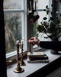Lighting A Candle In The Window Window Candles Candlelight Light In The Dark