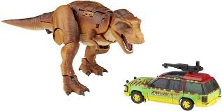 The franchise encompasses toys, animation, comic books, video games and films. Transformers Jurassic Park Are Officially Crossing Over In Toy Form