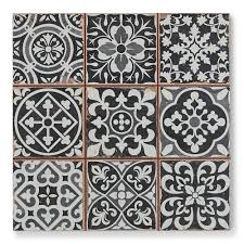 Tapestry definition, a fabric consisting of a warp upon which colored threads are woven by hand to produce a design, often pictorial, used for wall hangings, furniture coverings, etc. Tapestry Black Patterned Tiles Porcelain Superstore