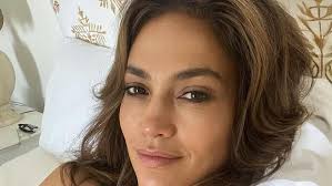 Jennifer Lopez Shares Selfie Wearing Lacy Green Lingerie in Bed
