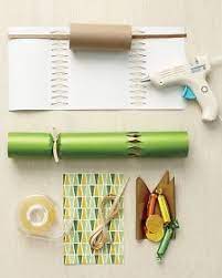 The finished cracker will be approximately 10 inches in length and have a fillable space measuring 2 inches in diameter by 4 inches in length. 12 Easy Christmas Crafts Anyone Can Make This Holiday Season Diy Christmas Crackers Easy Christmas Crafts Christmas Crackers