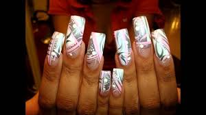 At what point does a nail design stop being wearable and become purely conceptual, a thing to be looked at and appreciated from a safe distance but never actually applied? 2014 Extreme Crazy Nail Art Amazing New Year Youtube