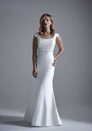 Monza A Modern And Minimalistic Satin Wedding Dress With Beaded Empire Slim Fit And Statement Low Back Ivory Dresses Wedding Dresses Satin Wedding Dress
