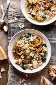 Crockpot Parmesan White Bean Chicken Soup With Roasted Delicata Squash Half Baked Harvest Recipe In 2020 Recipes Food Half Baked Harvest Recipes