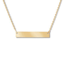 Crafted of 10k yellow gold, this fabulous bar necklace features a textured line accented with a white rhodium flash. Bar Necklace 10k Yellow Gold 16 Adjustable Kay Outlet