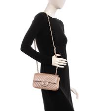 Check spelling or type a new query. Chanel Metallic Caviar Chevron Quilted Mini Rectangular Flap Rose Gold 203025 Fashionphile