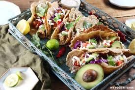 To serve, place fried fish in a tortilla, and top with shredded cabbage, and white sauce. Gluten Free Low Carb Keto Fish Tacos My Pcos Kitchen