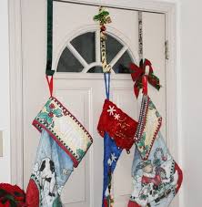 Here are 6 creative ways how to hang stockings without a mantel for christmas! How To Hang Christmas Stockings Without A Mantle Hanging Christmas Stockings Hanging Stockings Christmas Stocking Holders