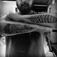 Either the magnificent peacock, or the lesser acknowledged, but equally brilliant turkey tail feathers could be spread across the base of the back to create an intricate look. Top 40 Best Turkey Tattoos For Men Game Bird Design Ideas