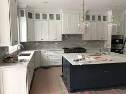 For some, having that extra wall space really opens up the room; Knobs On Top Glass Cabinets Or Not