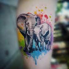 Douce Elephant Tatouage Commemorez Maternite De Pluie Colortattoo Watercolortattoo Elephant Tattoo Design Colorful Elephant Tattoo Elephant Tattoo