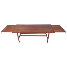 Coffee table extendable to a dining table in 3 simple steps, for more info please visit : Mid Century Danish Teak Extendable Coffee Table For Sale At 1stdibs