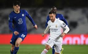 T.courtois, v.junior, e.militao, r.varane, nacho, marcelo, d.carvajal, l.modric, casemiro, t.kroos, k.benzema chelsea: Hx3hi8rpbiqzem