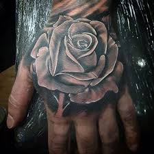 49 Best Hand Tattoos For Men Badass Designs Ideas 2019 Rose Tattoos For Men Rose Hand Tattoo Hand Tattoos For Guys