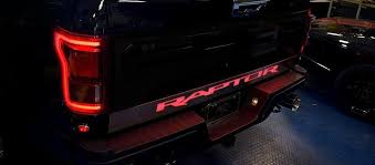 2017 2019 Ford Raptor Light Up Raptor Tailgate Rocker Panel Brushed Stainless Steel W Red Led Ford Raptor Ford Raptor Lighting Ford Raptor Accessories